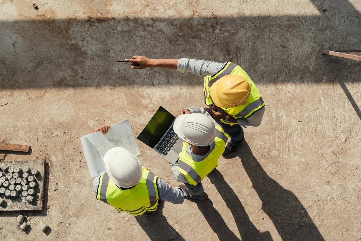 aerial view of builders on a construction site